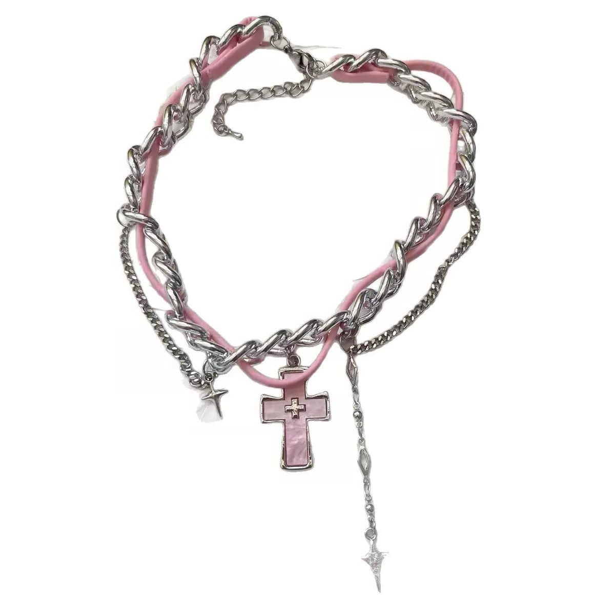 Close-up of pink leather spliced chain choker with cross star charm grunge necklace
